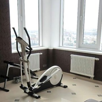 Радиатор секционный Arbonia (Арбония) 2057V/10 нижнее подключение (с вентилем) № 69 твв 1/2″ без накладок RAL 9016 Белый