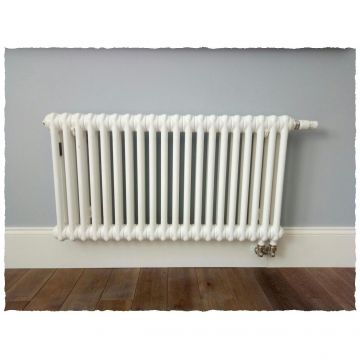 Радиатор секционный Arbonia (Арбония) 2057V/18 нижнее подключение (с вентилем) 1/2″ без накладок RAL 9016 Белый